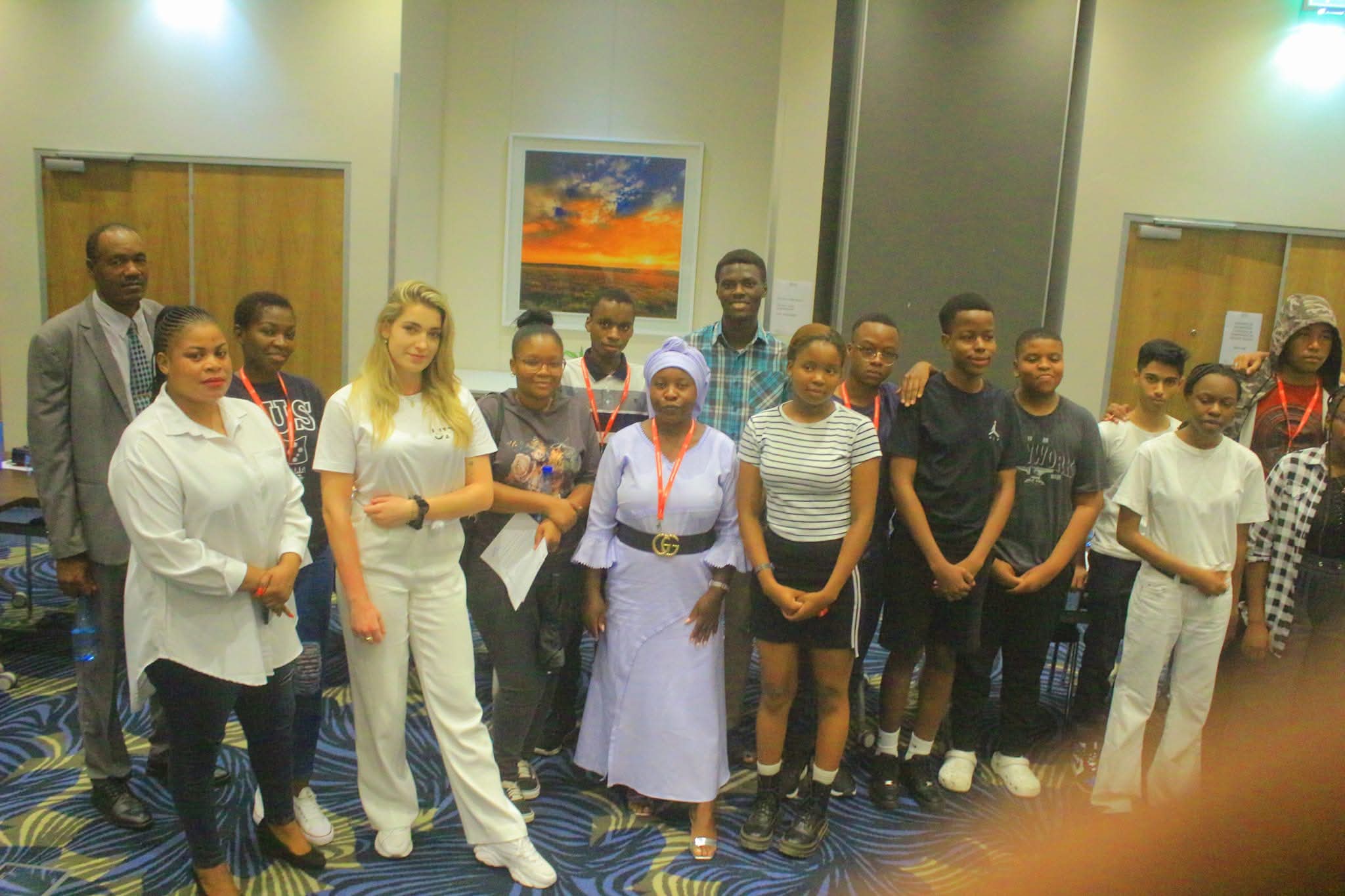 A group of Dentcor students and staff at a study-abroad orientation seminar